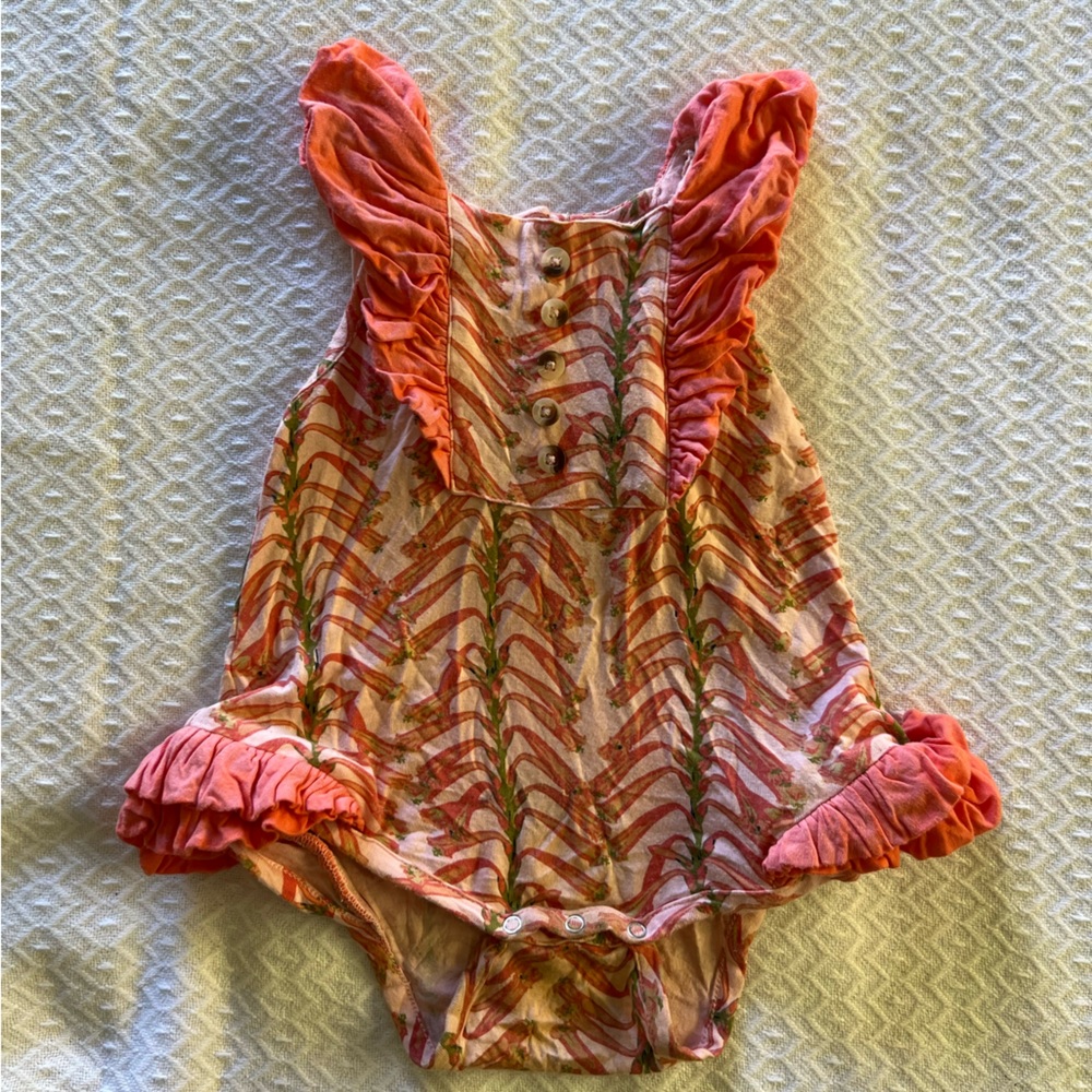 Kate Quinn Ruffle Onesie